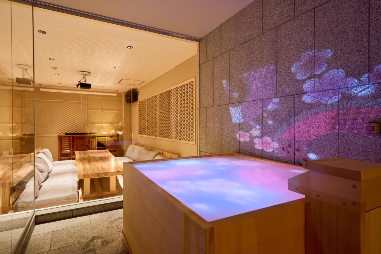 Konjakuso Osaka Tempozan "Ikesu" Projection M Apping Spa Konjakuso Osaka Tempozan "Takadoro" Wheel View Extérieur photo