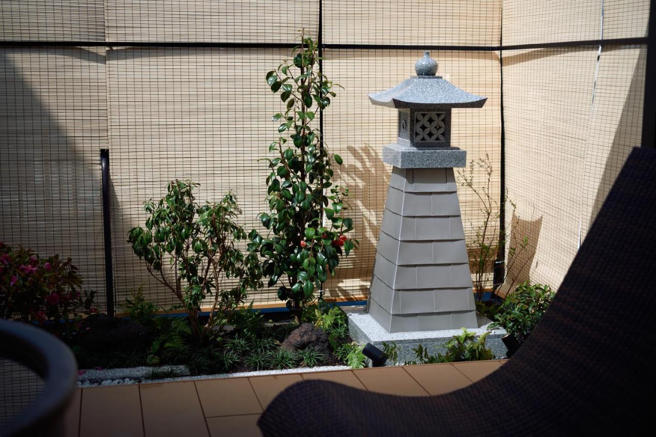 Konjakuso Osaka Tempozan "Ikesu" Projection M Apping Spa Konjakuso Osaka Tempozan "Takadoro" Wheel View Extérieur photo