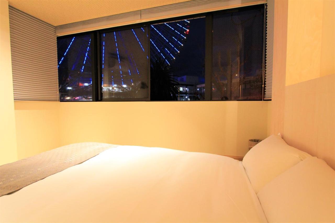 Konjakuso Osaka Tempozan "Ikesu" Projection M Apping Spa Konjakuso Osaka Tempozan "Takadoro" Wheel View Extérieur photo